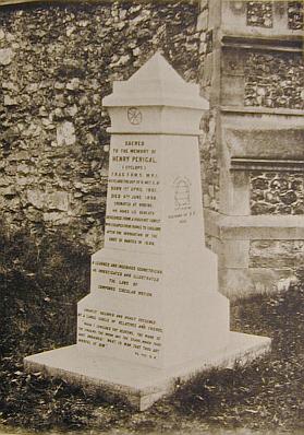 The tombstone as it appeared in a photograph in Frederick Perigal's memoir. The dissection diagram is on the invisible face around to the left. The diagram on the right illustrates a fact about parabolas.