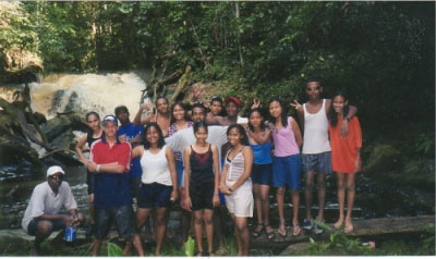 Adrian with students in Guyana