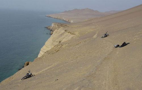Motorbikes abandoned after a close call on a cliff in Peru