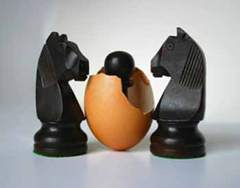 Two chess figures with offspring