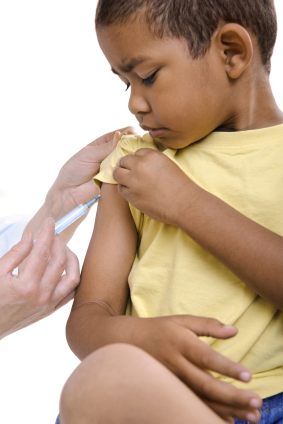 A boy being vaccinated