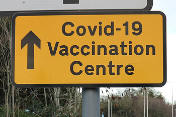 Road sign for vaccination centre