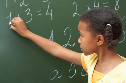 Child at blackboard