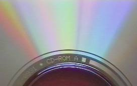 Figure 2: The grooves on a CD are only 0.5 micro-metres wide and make a good diffraction grating, resulting in coloured interference patterns.