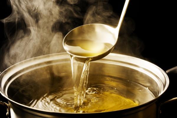 Spoon in a pot of soup