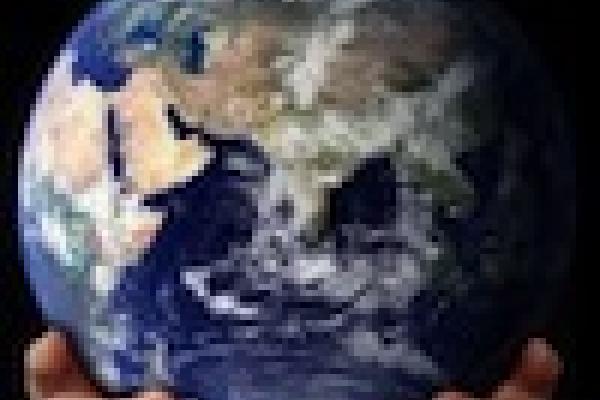 Image of the Earth in someone's hands