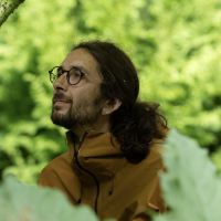 Sam Moore in a forest