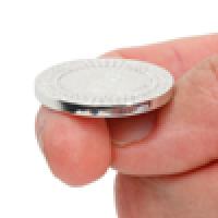 Someone about to flip a coin